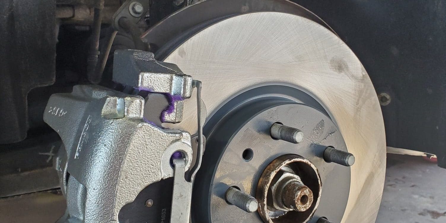 59 Auto Repair - Squeaking while braking? - Image 1